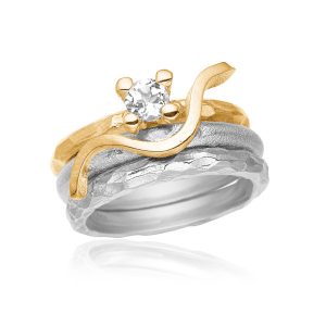 Smuk kombination af samleringe i guld og sølv