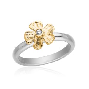 Samlering med guldbelagt blomst